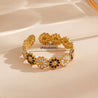 Bague Marguerites Noires & Blanches – Acier Inoxydable  12 Fleurs en Relief "Marguerite" Mara Bijoux