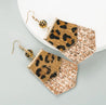 Boucles d’Oreilles Pendantes Léopard en Acier Inoxydable Doré – Strass Marron & Noir, Franges Scintillantes Champagne – Écrin Offert "Anna" Mara Bijoux